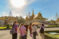 A group of students walks around a foreign country outside