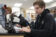 male student looks at laptop in lab class