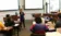 A picture of a women teaching a class