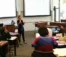 A picture of a women teaching a class