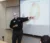 Professor Zevenbergen points to a graph on the projector screen in accounting class