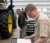A male student reviews a maintenance manual in the high bay of the Agriculture Stewardship Center