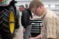 A male student reviews a maintenance manual in the high bay of the Agriculture Stewardship Center