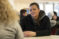 Female student chats with another