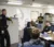 Students interact with a police officer