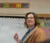 A student teacher stands at the front of class