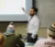 Dr. Cosgrove lectures at the front of class