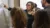 Dr. Zonnefeld points to the whiteboard in discussion with students