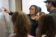 Dr. Zonnefeld points to the whiteboard in discussion with students