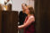 Female student practices at the organ with faculty member advising