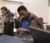 Male student uses M&Ms for an activity in stats class