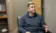 A picture of Alex Vasquez sitting in a chair