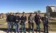 A picture of students holding shotguns at a trap shoot competition