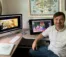 A picture of Joe at his desk where he illustrates