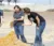 Dr. De Vries and a student look at wet distillers at a farm
