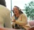 Dr. Olson speaks with a colleague