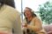 Dr. Olson speaks with a colleague