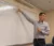 Actuarial science professor points to an equation on the whiteboard