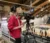 A student runs a camera for a basketball game live streamed by the Dordt Media Network