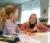 A Dordt student works with a student in class at a local elementary school