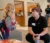 a male Dordt education student talks with a young student at an after school program