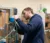 A student does wiring on equipment in the engineering technology lab