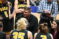 Dordt women's basketball coach huddles with players at the National Championship game