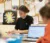 Female student works on mathematics project on desk