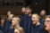 A close-up on several concert choir singers