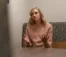 Dr. Tara Boer talks to someone using her hands to gesture