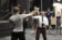 theatre arts professor and student act out a fighting scene