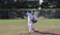 A picture of a baseball player pitching the ball