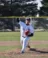 A picture of a baseball player pitching the ball