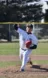 A picture of a baseball player pitching the ball
