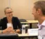 A picture of two faculty members talking