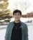 Tommy Shin smiling at the camera