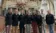 Students and faculty stand in front of famous organ