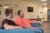 Two Dordt students sitting down in chairs having a conversation