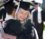 Two Dordt students graduating giving each other a hug