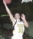 Old photo of young man playing basketball, going up for layup