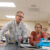 A Dordt Professor explaining something to his students