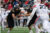 Dordt quarterback handing it off to the running back in a game