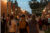 Students outside walking around campus talking