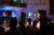 Dordt students on stage singing during church