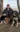 A picture of Braden Konyenbelt posing with his dogs