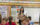 A teacher explains some material to a child
