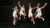 A group of basketball players jump for joy