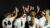The Dordt softball team in a team huddle