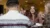 A picture of a student having dinner with friends