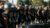 Dordt's football team gathers during a time-out